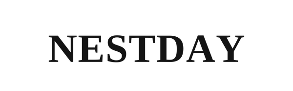 The word 'NESTDAY' is displayed in a bold, black serif typeface against a solid white background.
